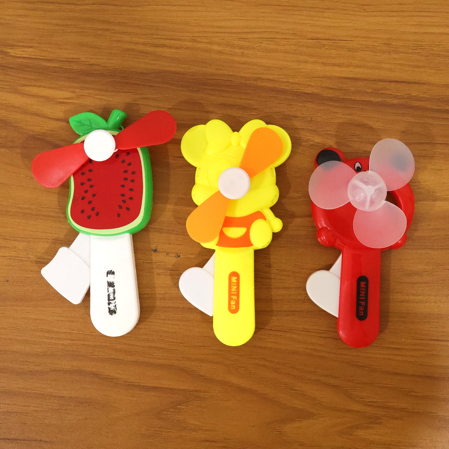 Hand Press Mini Portable Fan Toy (1 Pc Mix Color Design) Toys & Games