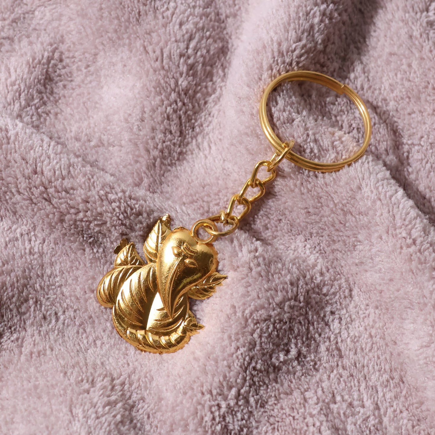 Golden Ganesh Leaf Design Keychain (1 Pc) keychains