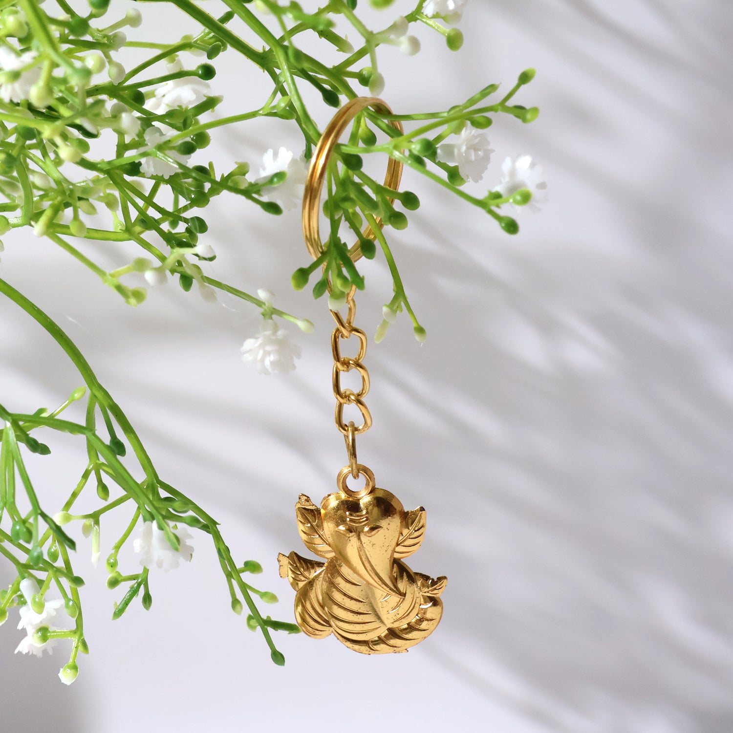 Golden Ganesh Leaf Design Keychain (1 Pc) keychains